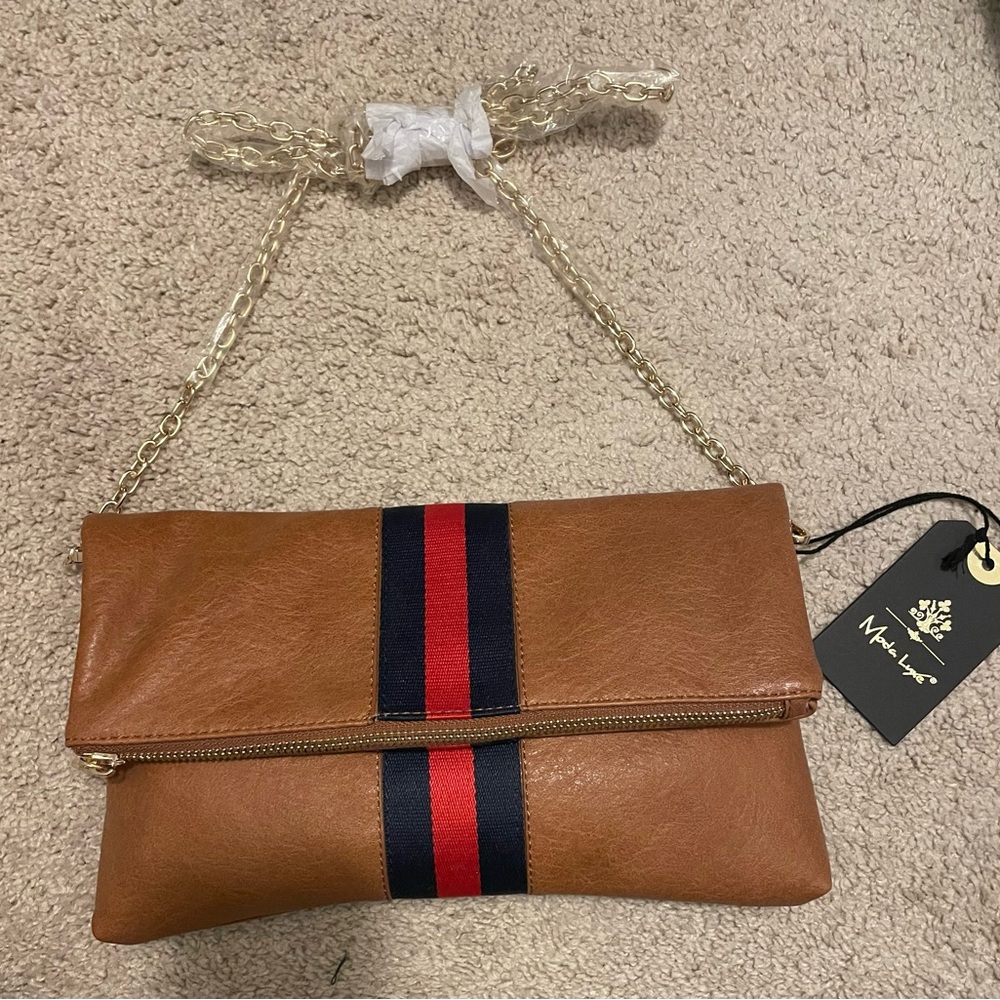 Camel clutch with navy and red stripe